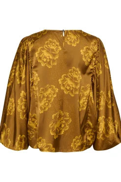 CUrosie Blus