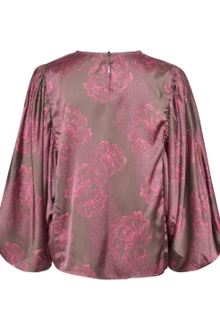CUrosie Blus