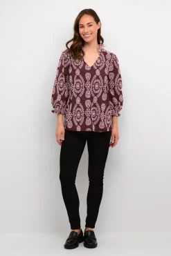 CUtia Blus